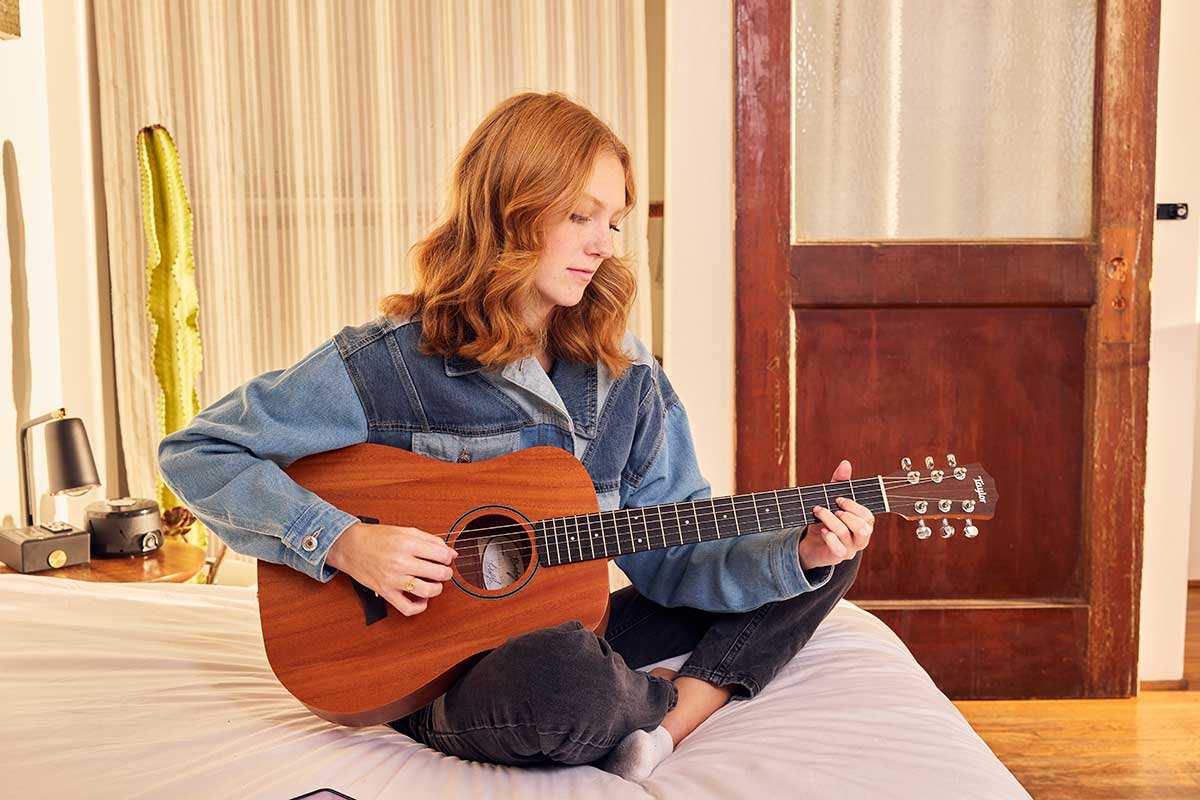 Girl Playing BT2 Baby Taylor Guitar